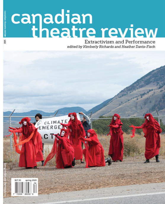 Canadian Theatre Review magazine cover showing the image of six people wearing a red outfit with their faces painted in white, and two people holding a poster where it reads "Climate Emergency Acts".