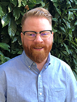 Headshot of Dr. Evan T. Taylor, CHASI Faculty Associate from the School of Social Work & Human Services. 