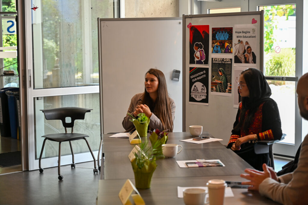 Photo of Chelsea Klassen moderating the panel