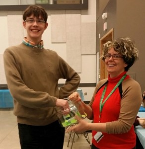 UFV Political Science student, Travis Mackenzie draws the scrabble prizes with Michelle Riedlinger