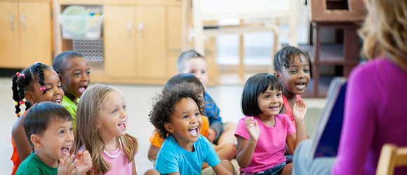 Children laughing and smiling in a class