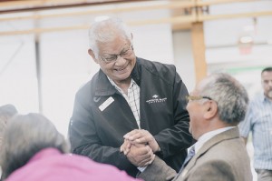 Elder greeting Honorable Steven Point at Indigenizing the Academy Gathering