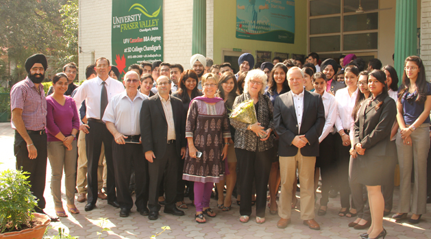 UFV president Mark Evered along with his wife Maureen (to his right, holding flowers), instructor Sylvia Peary, Peter Geller, UFV vice provost, assoc. VP academic, instructor George Peary, and to the far left, UFV India associate director Gurneet Anand, with UFV's BBA staff and students in Chandigarh, India. Centre for Indo-Canadian Studies director Satwinder Bains is also on the trip.