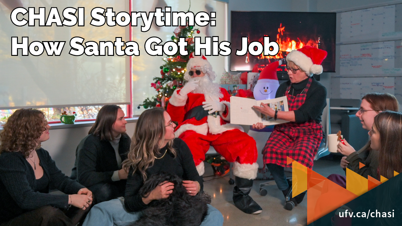 Photo of someone wearing a Santa costume and someone wearing a Mrs. Claus costume reading a storybook to a group of adults sitting on the floor. They are surrounded with holiday decorations. Text reads "CHASI Storytime: How Santa Got His Job."