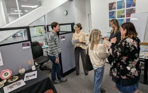 Faculty and TLC staff conversing