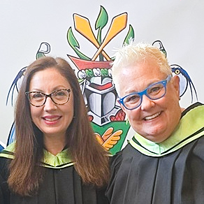 Andrea and Smitting wearing convocation gowns