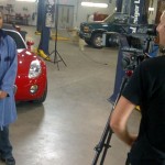 Student video host Sheetal Deo with HuStream's Jordy Starling, filming in the automotive shop at UFV's Trades and Technology Centre, Chilliwack.